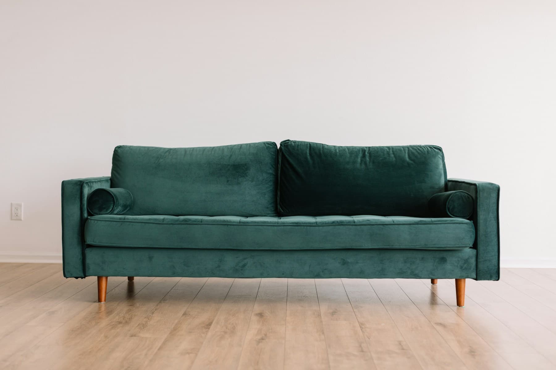 Curated neutral sofa set with coordinated pillows and living room furniture